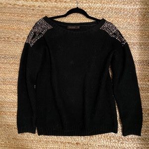 The limited loose fit black gem encrusted sweater